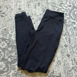 Lululemon size 6 black leggings with knee slits/cut outs